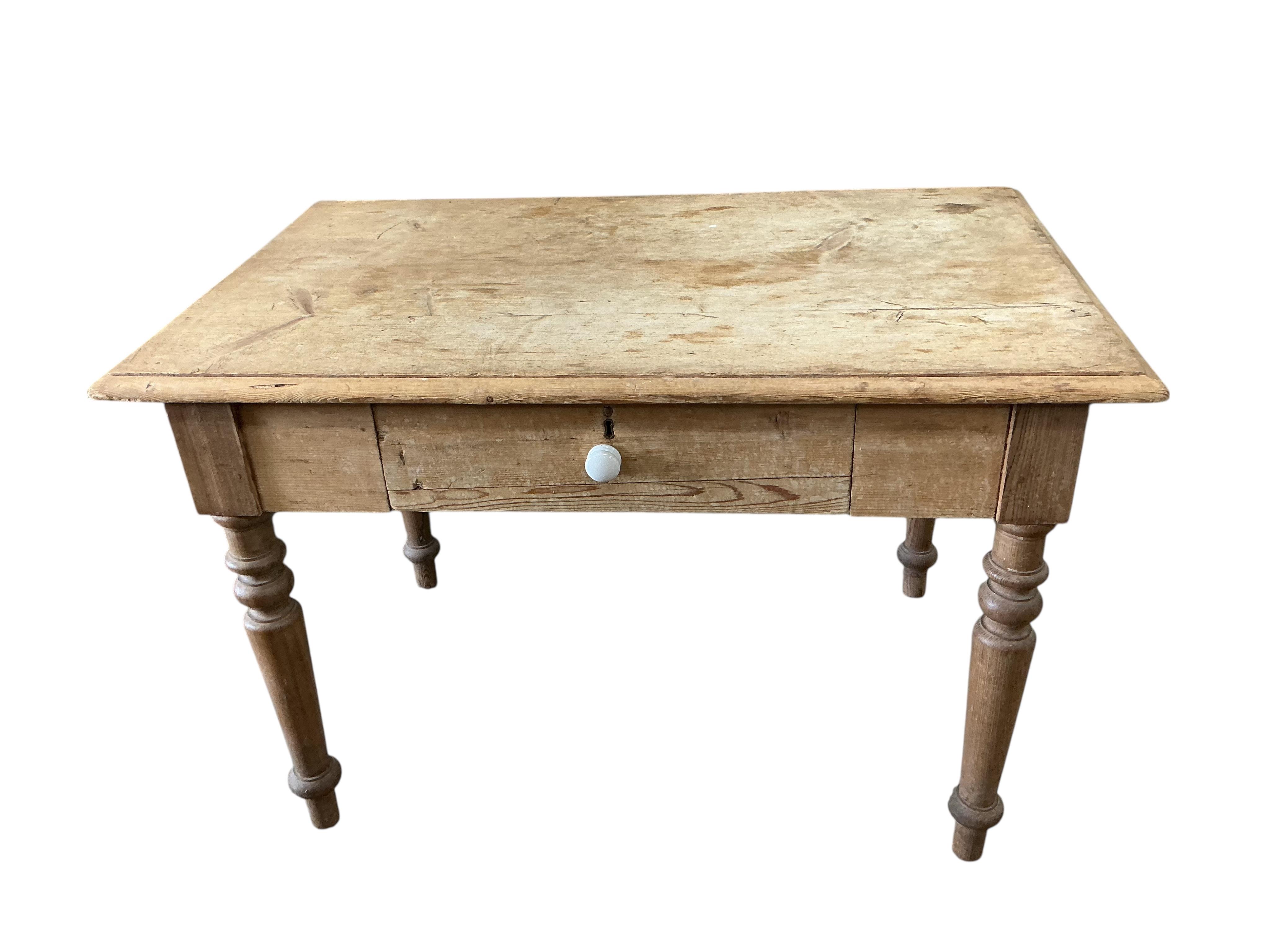 A small Victorian rectangular pine kitchen table, fitted drawer, width 114cm, depth 69cm, height 75cm